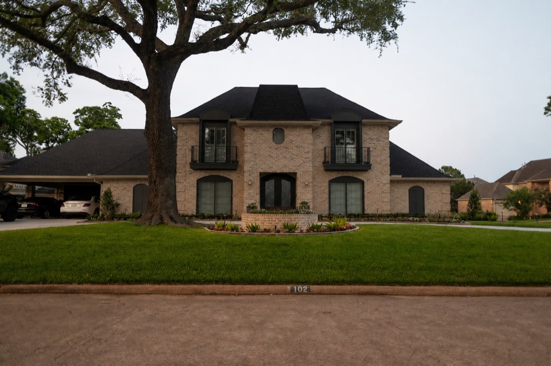 Client home and front landscaping in daylight