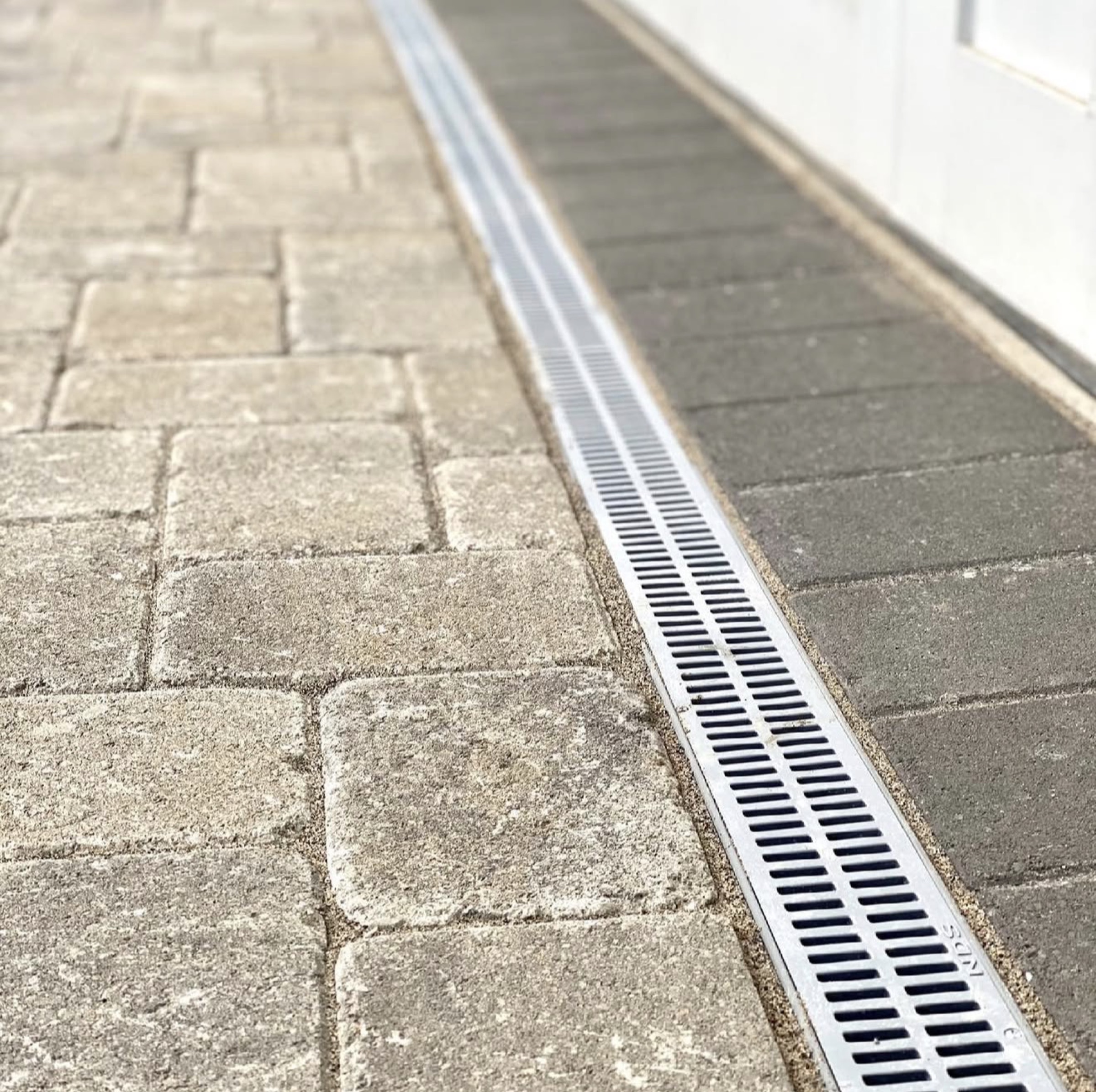 Linear channel drain on a Houston hard surface