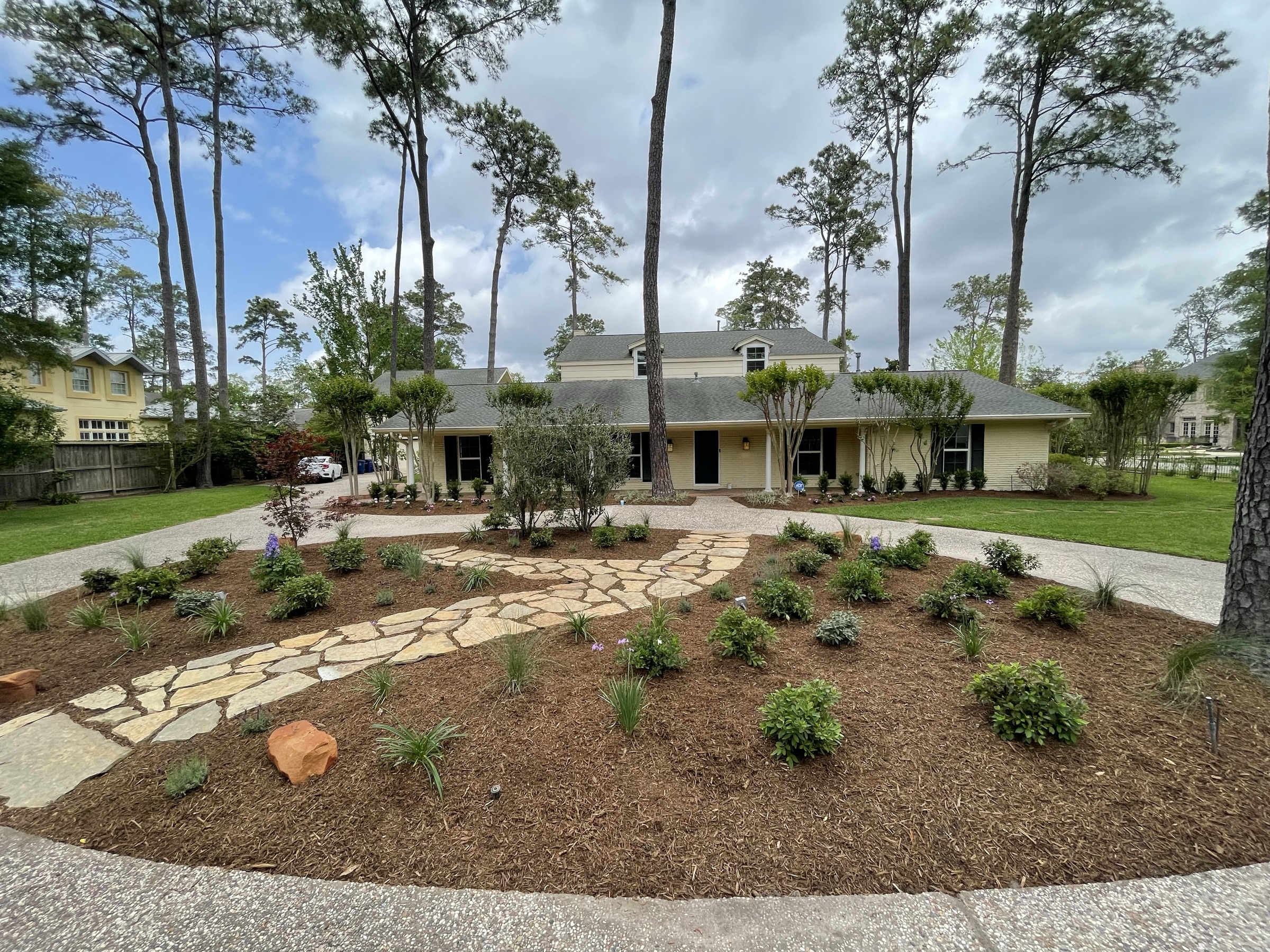 Concrete and paver work on a Houston lot