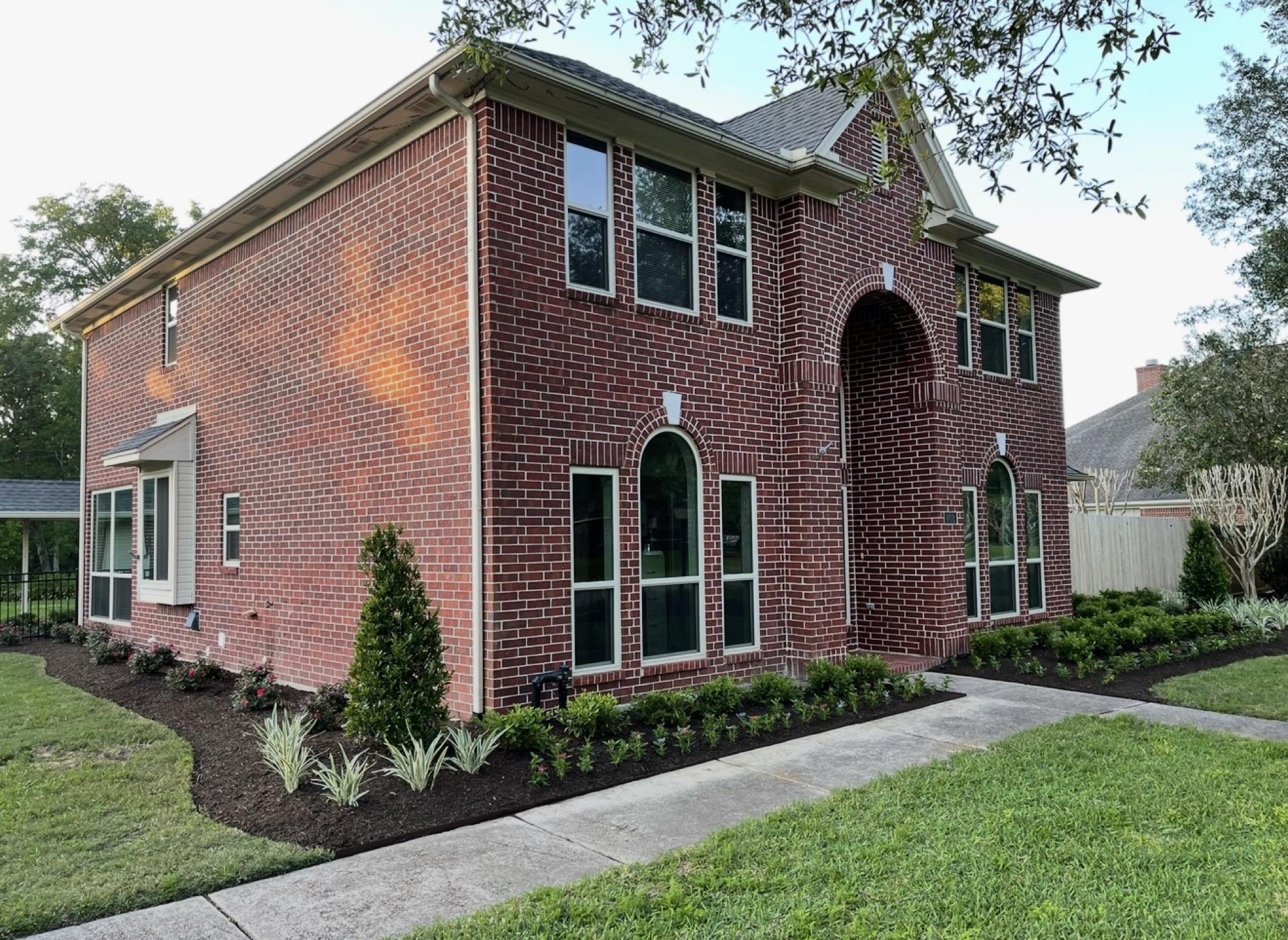 Landscaping company in Spring — colorful planted landscape beds
